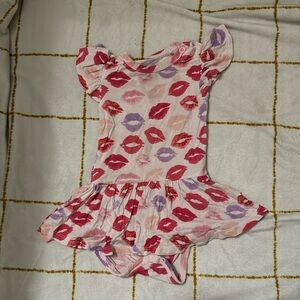 Posh peanut twirl onesie